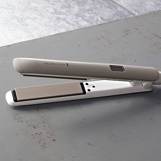����� ���� ���� �� Remington �������� Hydraluxe S8901